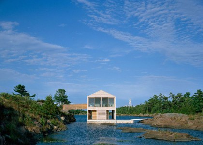 A structure of steel pontoons allows this wooden cabin to float on the surface of Lake item-thumbnail